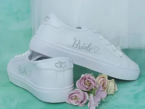 Customisable Bride Script & Heart Detail Wedding Bridal Trainers. Standard & Wide Fit.